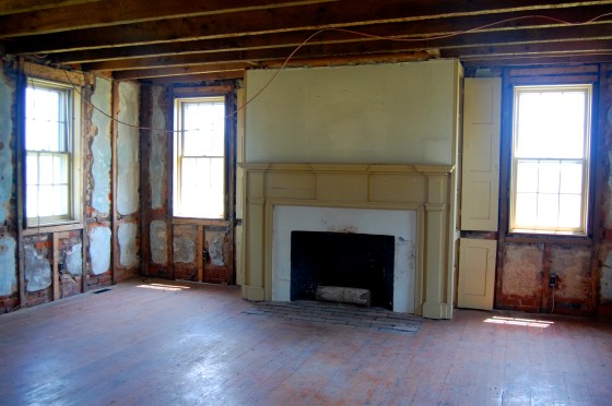 fireplace inside the old farmhouse- ready for renovation